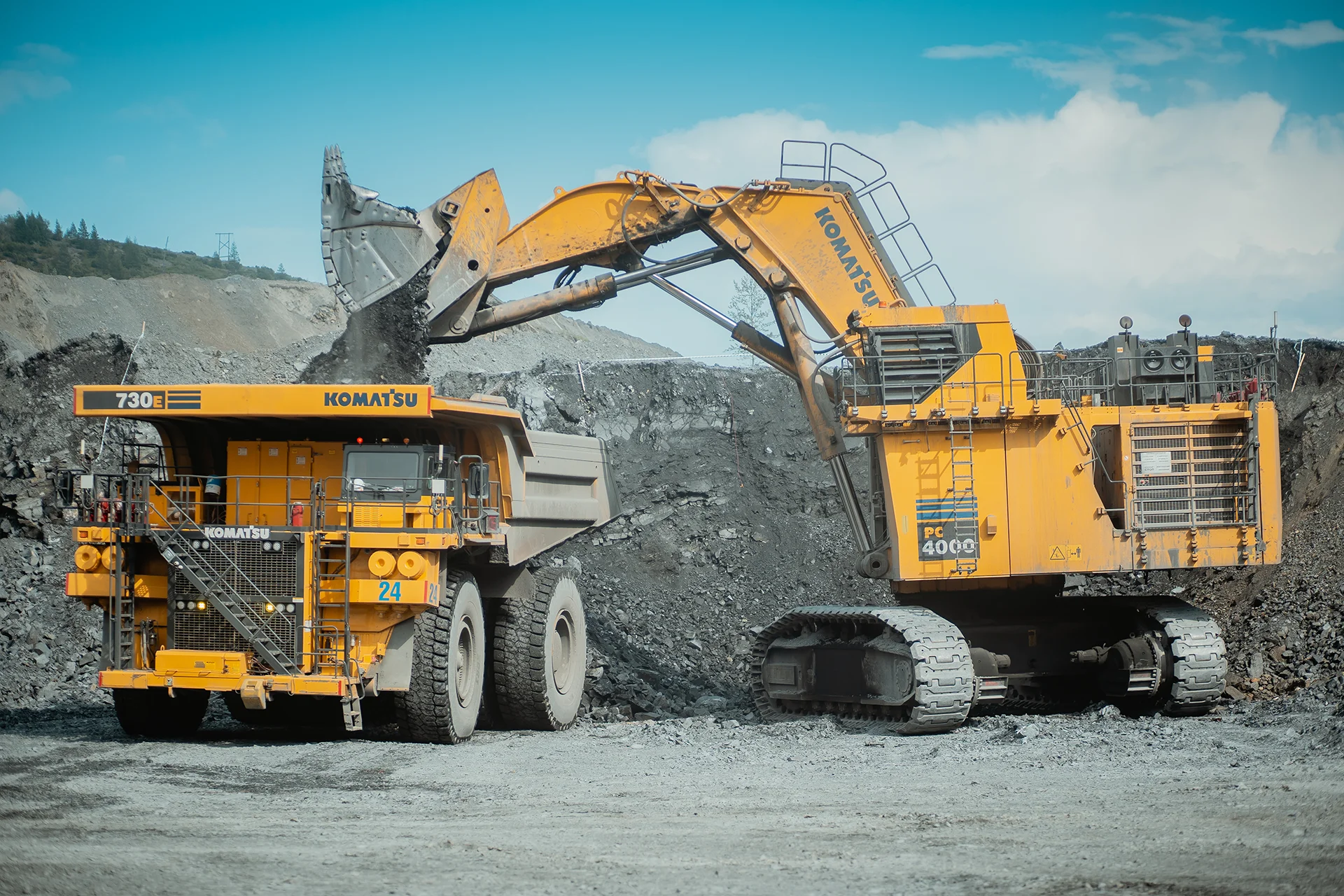 Heavy plant working an extraction and earthworks site supported by specialist procurement