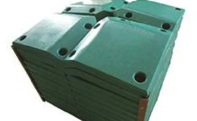Moulded marine fender corner pads stacked for dispatch