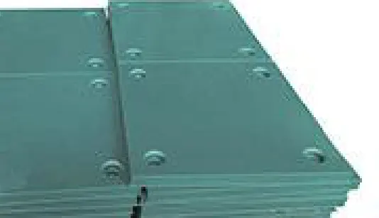 Flat marine fender facing pads with fixing holes